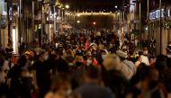 People walk along Francisco I. Madero pedestrian street as the coronavirus disease (COVID-19) pandemic continues, in downtown Mexico City, Mexico January 5, 2022. Reuters/Luis Cortes


