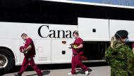 A bus carrying Canadian Armed Forces (CAF) medical personnel arrives at Villa Val des Arbres, a seniors' long-term care centre, to help amid the outbreak of the coronavirus disease (COVID-19), in Montreal, Quebec, Canada April 20, 2020. Reuters/Christinne Muschi/File Photo