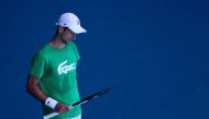 Serbian tennis player Novak Djokovic practices at Melbourne Park as questions remain over the legal battle regarding his visa to play in the Australian Open in Melbourne, Australia, January 13, 2022. Reuters/Loren Elliott