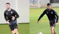 Al Sadd's Guilherme dos Santos Torres and Hassan Al Haydos during a training session, yesterday. 