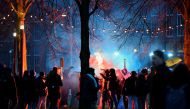 Demonstrators take part in a protest against the Dutch government's restrictions imposed to contain the spread of the coronavirus disease (COVID-19), in Amsterdam, Netherlands, January 16, 2022. REUTERS/Piroschka van de Wouw
