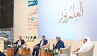 Minister of State and President of Qatar National Library H E Dr. Hamad bin Abdulaziz Al Kawari (second-right) with other participants during the seminar.