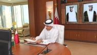 Chairman of the General Authority of Customs H E Ahmed bin Abdullah Al Jamal signing the MoU in a virtual event. 