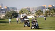 Players in action at Doha Golf Club.
