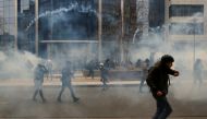 Protesters react during a demonstration against the Belgian government's restrictions imposed to contain the spread of the coronavirus disease (COVID-19) in Brussels, Belgium, January 23, 2022. REUTERS/Johanna Geron
