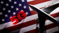 FILE PHOTO: 5G words and an airplane toy are placed on a printed U.S. flag in this illustration taken January 18, 2022. REUTERS/Dado Ruvic/Illustration/File Photo
