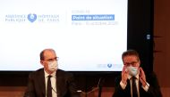 FILE PHOTO: French Prime Minister Jean Castex listens to Martin Hirsch, the Director General of Assistance Publique-Hopitaux de Paris (AP-HP), during a AP-HP meeting in Paris, France October 15, 2020. Ludovic Marin/Pool via REUTERS/File Photo
