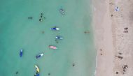 FILE PHOTO: People relax along White Beach amid the coranavirus disease (COVID-19) outbreak, in Boracay Island, Aklan province, Philippines, December 1, 2021. Picture taken December 1, 2021. Picture taken with drone. REUTERS/Eloisa Lopez/File Photo
