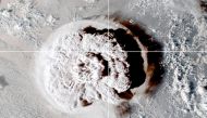The eruption of an underwater volcano off Tonga, which triggered a tsunami warning for several South Pacific island nations, is seen in an image from the NOAA GOES-West satellite taken at 05:00 GMT January 15, 2022. CIRA/NOAA/Handout via REUTERS/
