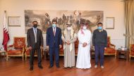 Secretary-General of Qatar Red Crescent Society Ali bin Hassan Al Hammadi and Ambassador of Yemen to Qatar H E Rajeh Hussen Badi with other official during a meeting.