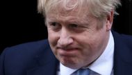British Prime Minister Boris Johnson walks outside 10 Downing Street in London, Britain, January 31, 2022. REUTERS/Henry Nicholls
