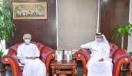 Qatar Chamber First Vice-Chairman Mohamed bin Towar Al Kuwari (right) with the Head of the Commercial Representative of the Sultanate of Oman in Qatar Ishaq bin Khalfan Al Busaidi during a meeting in Doha, yesterday.  