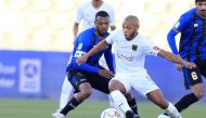 Al Rayyan's Yacine Brahimi vies for the ball with an Al Sailiya player. Pic: Hussein Sayed