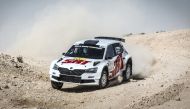 Mads Ostberg drives during the opening day of the  Qatar International Rally, yesterday. 