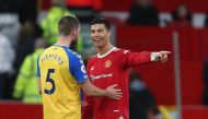 Manchester United's Cristiano Ronaldo and Southampton's Jack Stephens after the match REUTERS/Russell Cheyne
