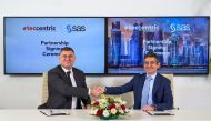 Bassel Al-Halabi (right), Managing Director at TecCentric, with Tayfun Topkoc, Managing Director, Middle East, and Africa, Turkey and Central Asia at SAS during the signing ceremony in Doha. 