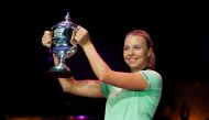 February 13, 2022 Estonia's Anett Kontaveit celebrates with the trophy after winning the final against Greece's Maria Sakkari REUTERS/Anton Vaganov/File Photo