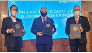 DA Secretary William Dar (left), with Baladna independent board member Aidan Tynan, and DTI Secretary Ramon Lopez during the agreement signing recently. 