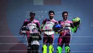 The podium winners of Race 2 of the fourth round of Qatar SuperStock 600 celebrate with their trophies.