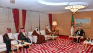 President of Algeria H E Abdelmadjid Tebboune with QC First Vice-Chairman Mohamed bin Towar Al Kuwari and other officials during a meeting, yesterday.  