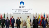 Attendees of the 6th GECF summit of heads of state and government pose for a group photo in Doha, Qatar February 22, 2022. Reuters/Imad Creidi