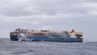 The ship, Felicity Ace, which was traveling from Emden, Germany, where Volkswagen has a factory, to Davisville, in the U.S. state of Rhode Island, burns more than 100 km from the Azores islands, Portugal, February 18, 2022. Portuguese Navy (Marinha Portuguesa)/Handout via REUTERS

