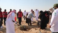 QBG officials during a wild desert tree restoration event at Rawdat Al Faras in Al Nasraniya.