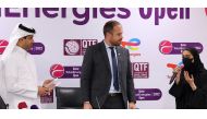 Qatari artist Noof Al Naimi speaking to Nasser Al Khelaifi (left), President of the Qatar Tennis, Squash and Badminton Federation, and Matthieu Bouyer (centre), Managing Director TotalEnergies EP Qatar and Country Chair.