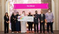 The winners of the first places RE-Team from Qatar University pose for a group photo.