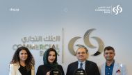 Amit Sah, EGM and Head of Retail Banking, Commercial Bank and Roya Khajeh, AGM and Head of Cards and Payments, Commercial Bank and other officials during the award ceremony.