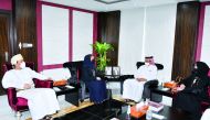 Officials of Qatar Chamber and Ministry of Commerce, Industry, and Investment Promotion of the Sultanate of Oman discussing economic cooperation.