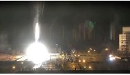 Surveillance camera footage shows a flare landing at the Zaporizhzhia nuclear power plant during shelling in Enerhodar, Zaporizhia Oblast, Ukraine March 4, 2022, in this screengrab from a video obtained from social media. Zaporizhzhya NPP via YouTube/via REUTERS 