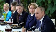 Russian President Vladimir Putin attends a meeting with flight personnel, students and employees of the Aeroflot Aviation School on the suburbs of Moscow, Russia March 5, 2022. Sputnik/Mikhail Klimentyev