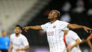 Al Sadd's Abdelkarim Hassan celebrates after scoring a  goal against Al Rayyan yesterday.