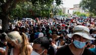 People gather outside Panama Embassy after the country tightened visa requirements, in Havana, Cuba, March 9, 2022. REUTERS/Amanda Perobelli
