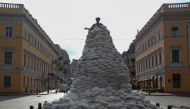 A monument of the city founder Duke de Richelieu is seen covered with sand bags for protection, amid Russia's invasion of Ukraine, in central Odessa, Ukraine March 9, 2022. REUTERS/Liashonok Nina
