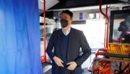 German Federal Health Minister Karl Lauterbach arrives in the #ImpfenHilft tour bus at the project's launch in Berlin, Germany March 10, 2022. Michele Tantussi/Pool via REUTERS
