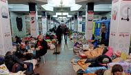People shelter from shelling in a metro station, as Russia's attack on Ukraine continues, in Kharkiv, Ukraine March 10, 2022. REUTERS/Vitalii Hnidyi/File Photo