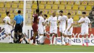 Al Sadd players celebrate after Boualem Khoukhi scored their first goal.