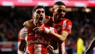 Atletico Madrid's Rodrigo De Paul celebrates scoring their second goal with Renan Lodi REUTERS/Susana Vera