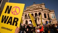 A demonstrator holds a 