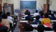 Students attend class in a school after they reopened amidst the spread of the coronavirus disease (COVID-19) pandemic in Mumbai, India, January 24, 2022. REUTERS/Francis Mascarenhas


