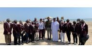 BPS students and officials during the beach clean-up event in Al Wakrah.