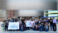 A team of students and teachers from MES Indian School attending the Amir Cup final.