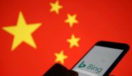 A smartphone with the Microsoft Bing logo is displayed against the backdrop of a Chinese flag in this picture illustration taken January 24, 2019. REUTERS/Dado Ruvic/Illustration/

