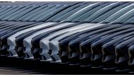 Tesla cars are seen parked at the construction site of the new Tesla Gigafactory for electric cars in Gruenheide, Germany, March 20, 2022. REUTERS/Hannibal Hanschke/File Photo
