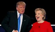FILE PHOTO: Republican U.S. presidential nominee Donald Trump shakes hands with Democratic U.S. presidential nominee Hillary Clinton at the conclusion of their first presidential debate at Hofstra University in Hempstead, New York, U.S., September 26, 2016. REUTERS/Mike Segar/File Photo/File Photo
