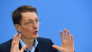 German Health Minister Karl Lauterbach speaks as he attends a news conference on the coronavirus disease (COVID-19) situation, in Berlin, Germany, March 25, 2022. REUTERS/Annegret Hilse/File Photo