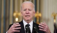 U.S. President Joe Biden responds to a question about Ukraine during an event to announce his budget proposal for fiscal year 2023, in the State Dining Room at the White House in Washington, U.S., March 28, 2022. REUTERS/Kevin Lamarque