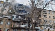 A view shows a residential building damaged by shelling, amid the Russian invasion of Ukraine, in Mykolayiv, Ukraine, in this handout picture released March 7, 2022. Press service of the State Emergency Service of Ukraine/Handout via REUTERS/File Photo

